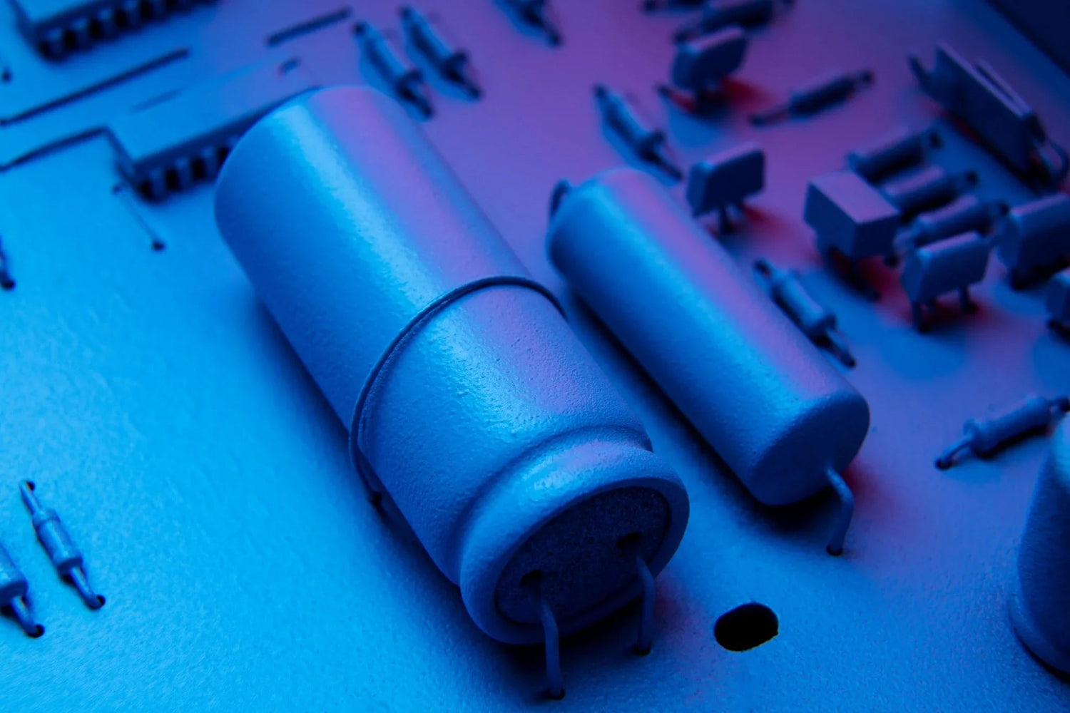 LiFePO₄ battery cells on circuit board with blue lighting